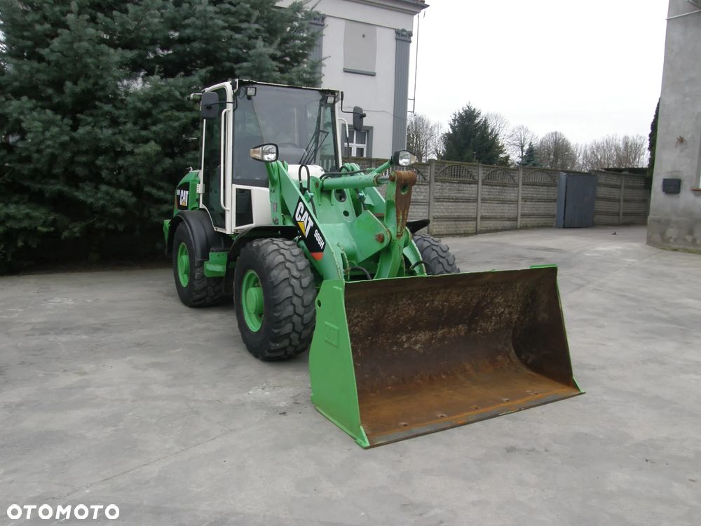 Caterpillar 906H 2009 łyżka widły ładowarka z Niemiec - 11