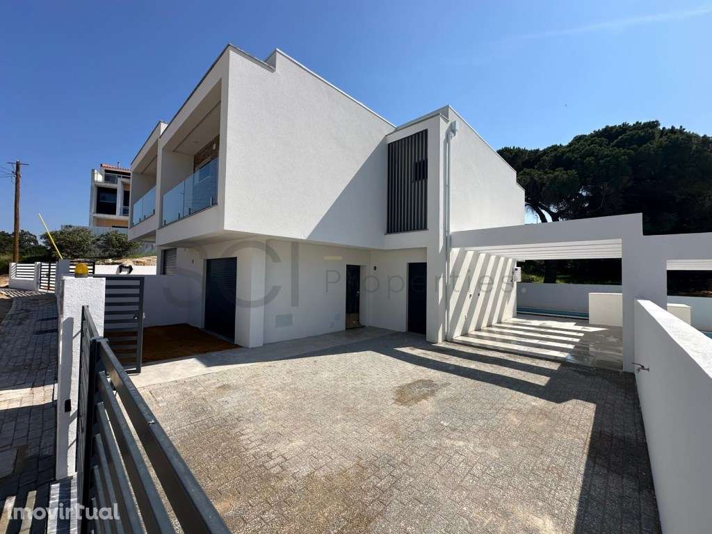 Moradia Nova T4 Geminada Fernão Ferro Pérgola e Piscina - Grande imagem: 3/21