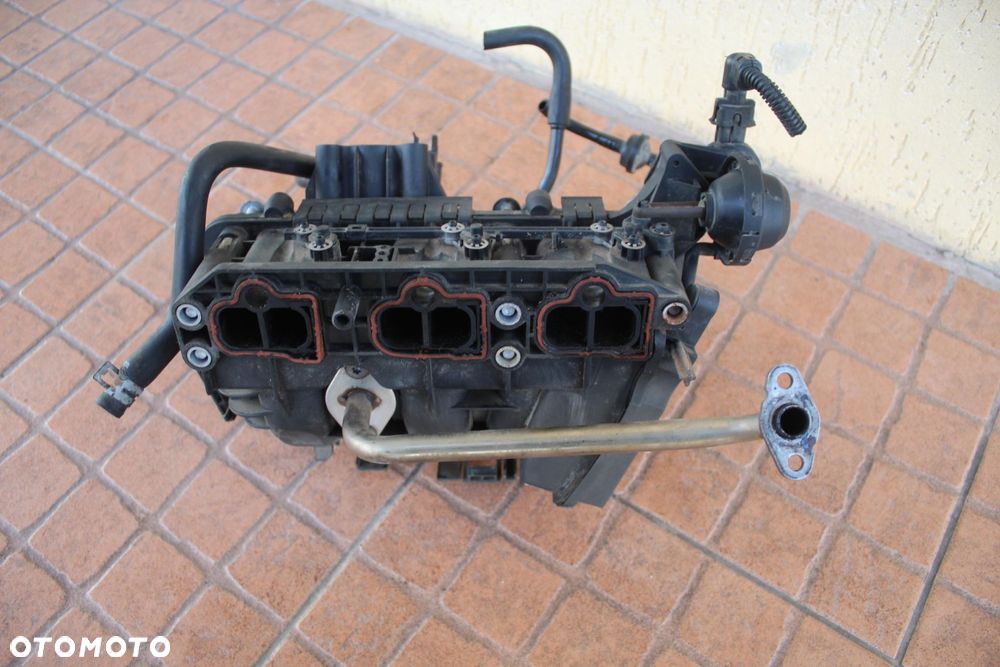 KOLEKTOR SSĄCY OPEL CORSA D 1.0 55557905 0280600062 - 5