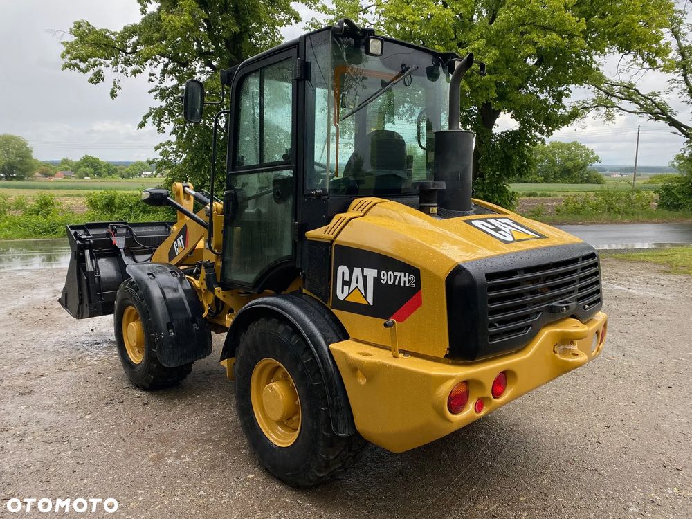 Caterpillar CAT 907H2, 2014 ROK, 6000 MTH, ŁYŻKA OTWIERANA + WIDŁY, z NIEMIEC, SUPER STAN, - 6