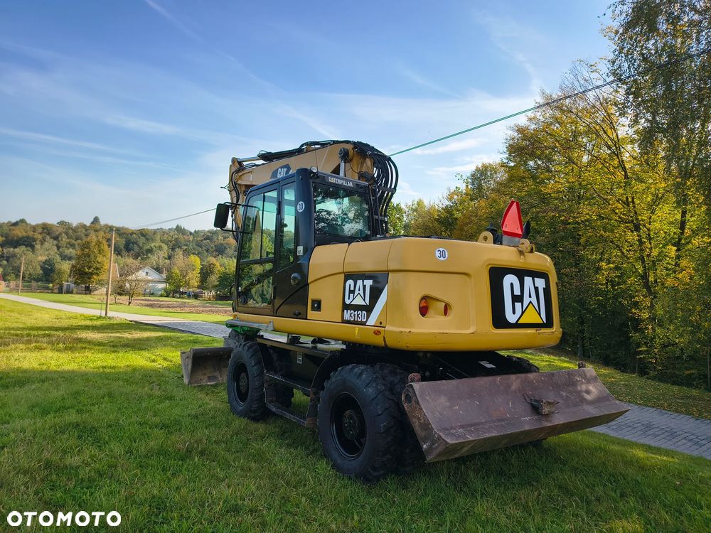 Caterpillar M313D - 7