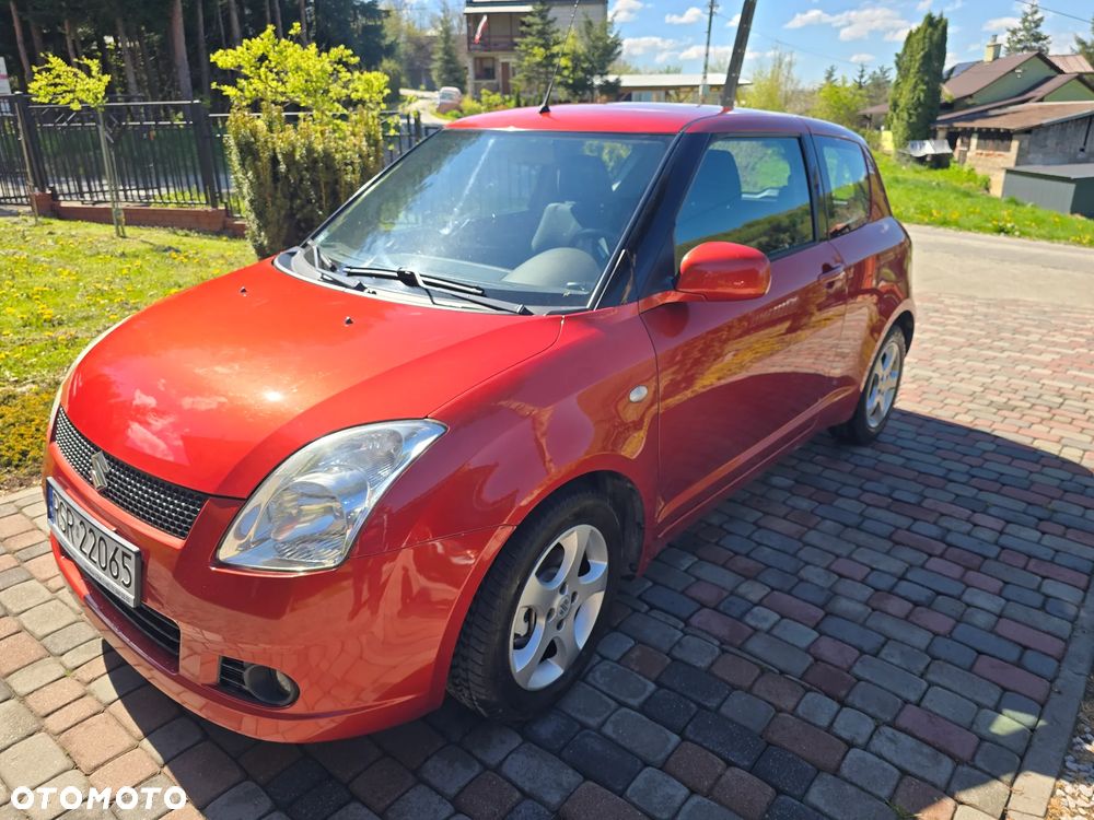 Suzuki Swift 1.3 Club - 4