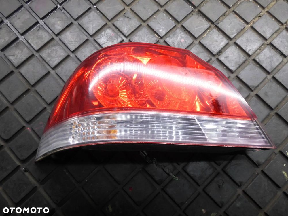 Lampa LEWA tylna tył MITSUBISHI LANCER VII SEDAN - 1