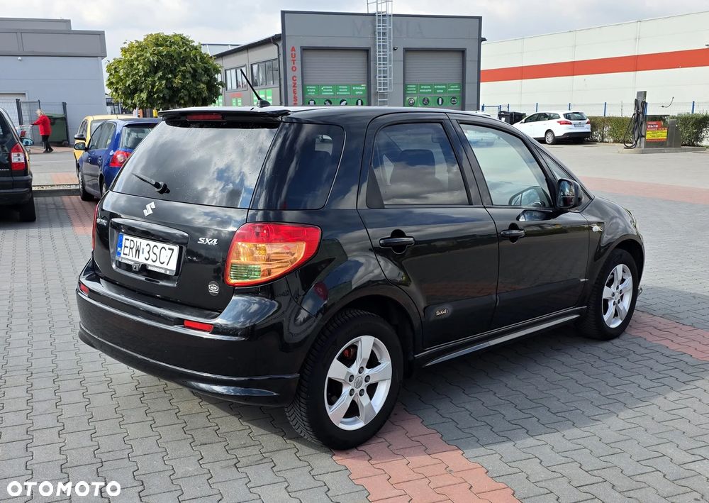 Suzuki SX4 1.6 Comfort Plus - 4