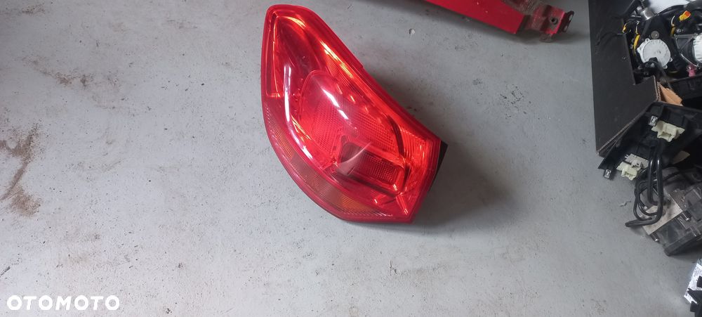 opel astra j  kombi lampy tył lewa  12r-16 poznan - 1