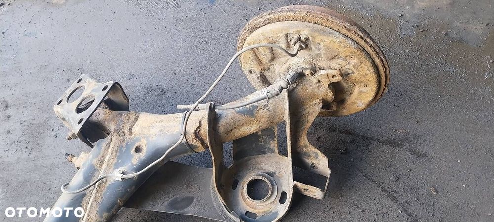 BELKA OŚ ZAWIESZENIA TYŁ BĘBNY Z ABS SKODA OCTAVIA I HB 5D - 2