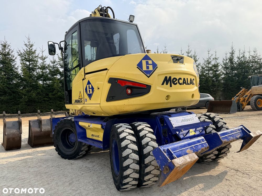 Mecalac Koparka 14 ton MECALAC 15 MWR koparko-ładowarka 3 łyżki widły 1 wł Centr.smarowanie Opony na BLIŹNIAKU 80%Camso ładowarka 714 12MTX 4x4 skrętne KLIMA kabina Premium silnik 146KM volvo EW140B DEUTZ szybka 35km/h - 4