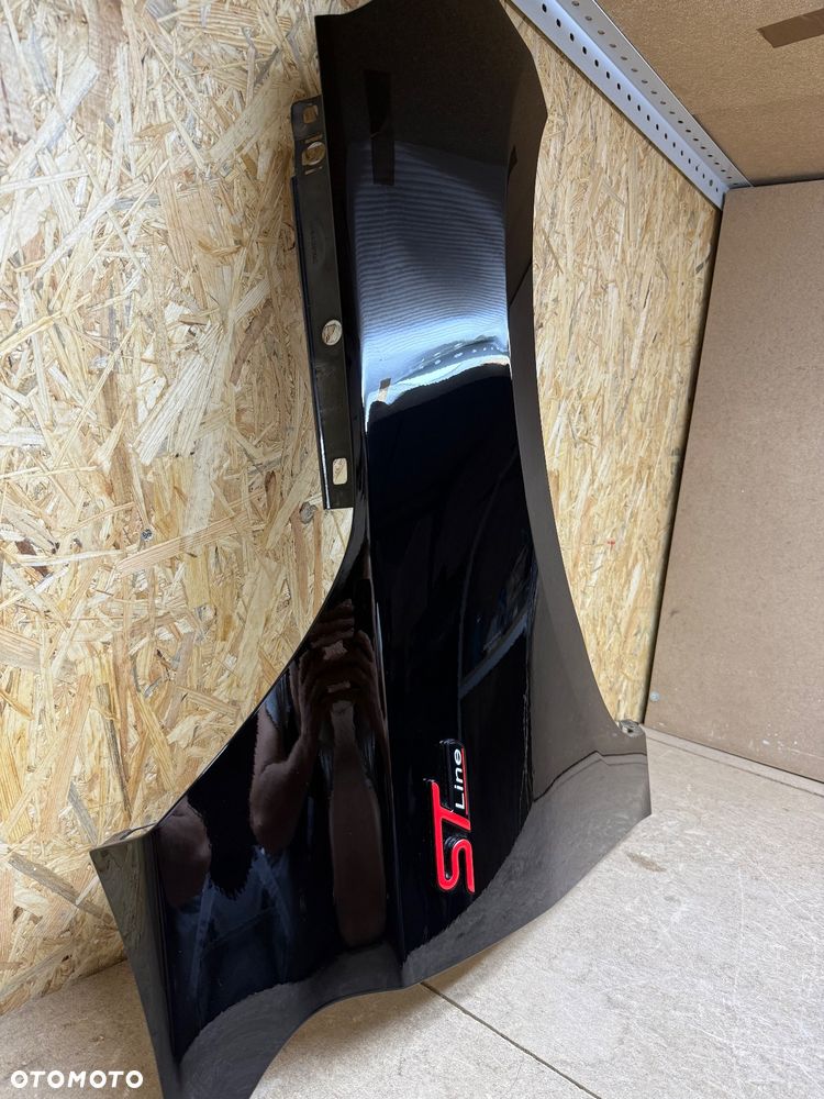BŁOTNIK PRZÓD PRAWY FORD FOCUS MK4 CZARNY JX7B-A16015AC - 2