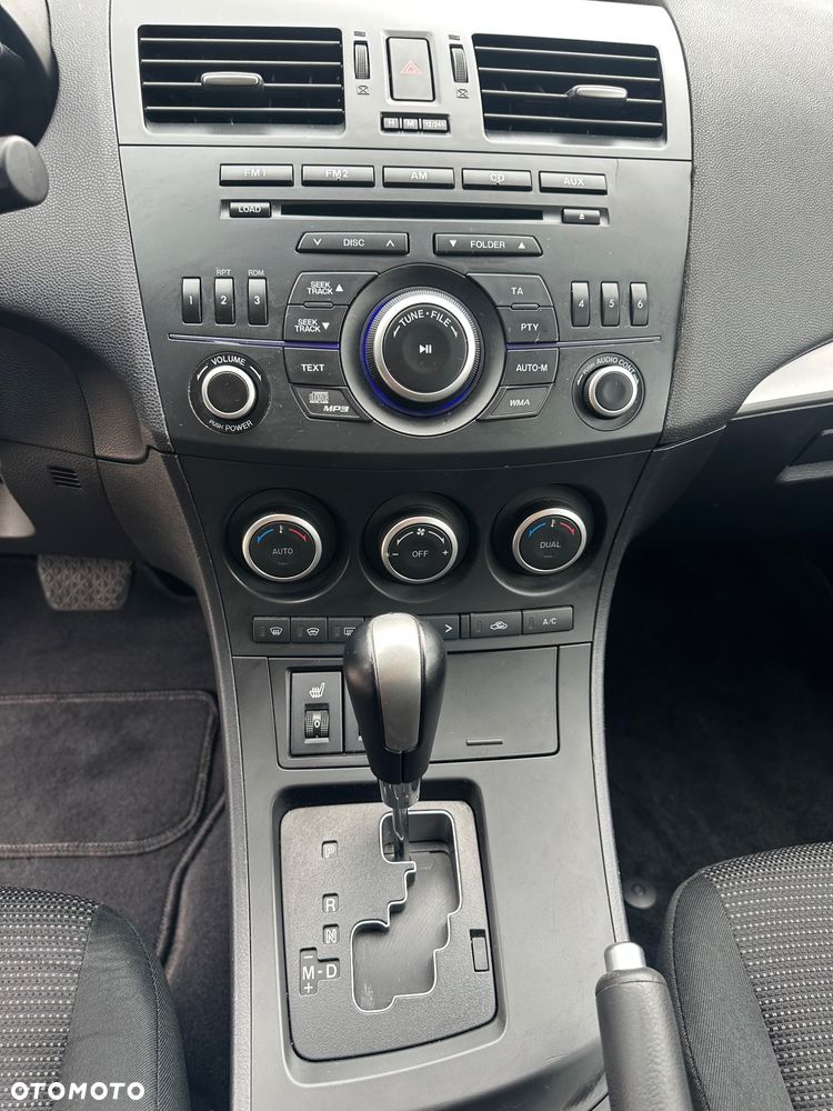 Mazda 3 2.0 Exclusive + - 14