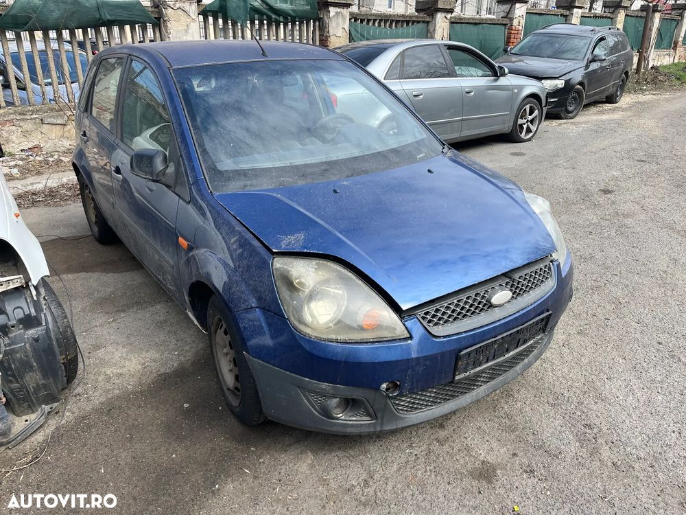 Dezmembrez Ford Fiesta MK5 benzina albastru 4 usi 2007 - 6
