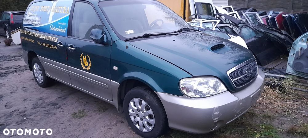 blotnik prawy lampa  Kia Carnival I  99-06r - 4