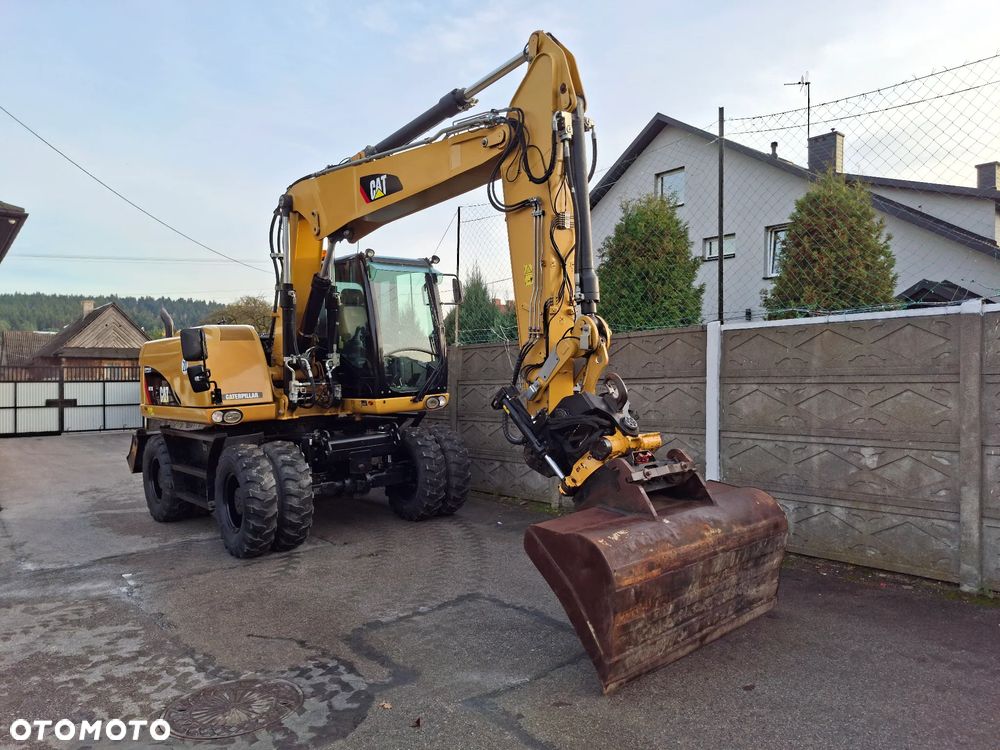 Caterpillar CAT M 313 D - 12