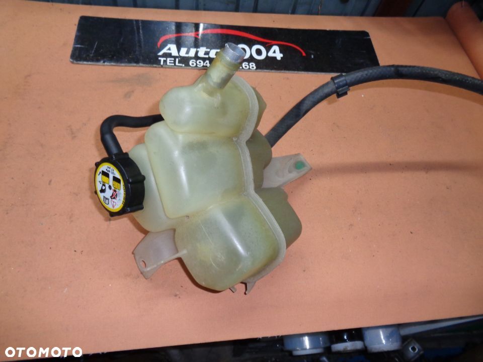 MAZDA TRIBUTE FORD MAVERICK ZBIORNIK wyrownawczy czesci rozne oryginal