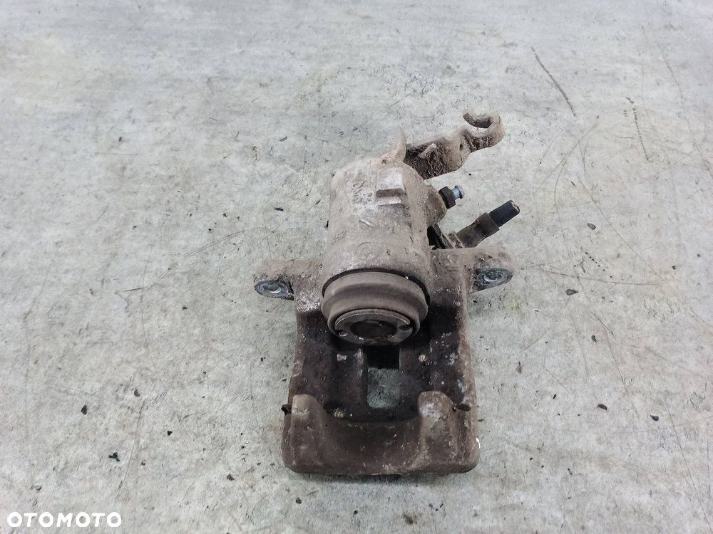 ZACISK HAMULCOWY PRAWY TYŁ VW GOLF V TRW 1.9 TDI - 2