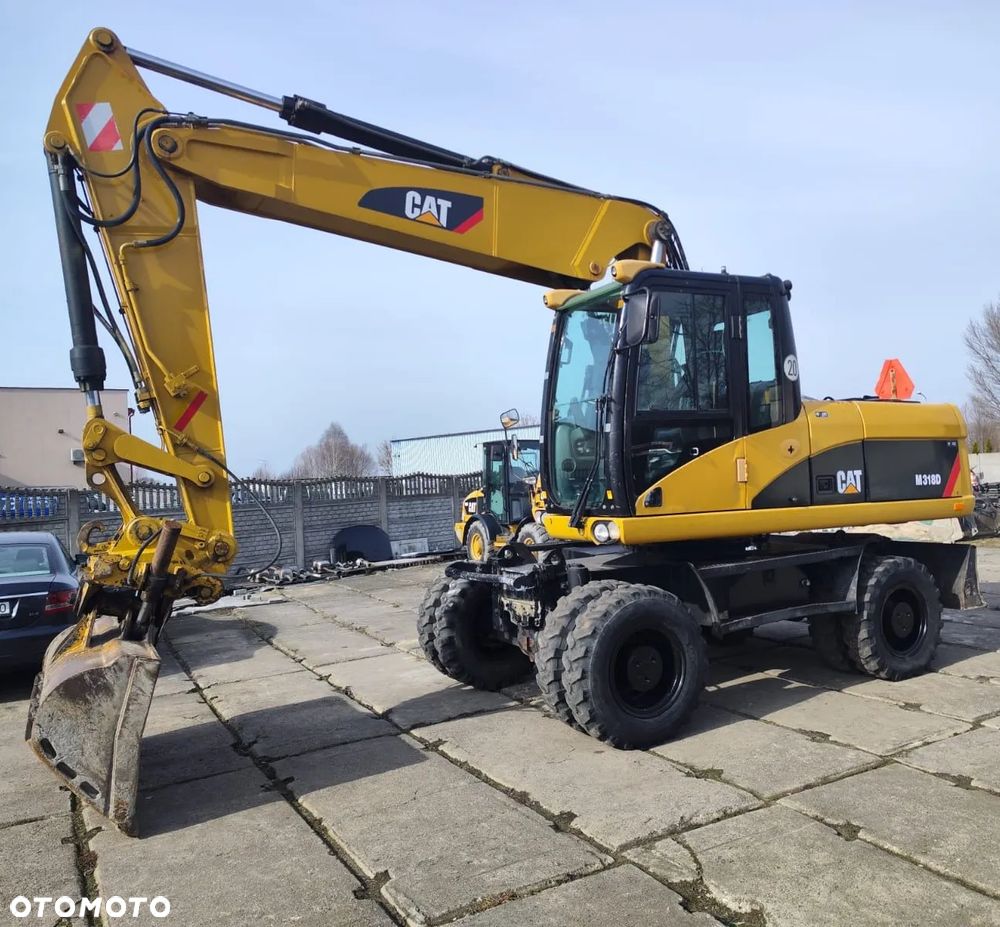 Caterpillar 318D - 4