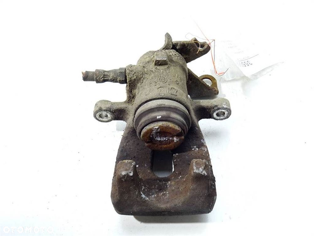 ZACISK TYŁ LEWY - 86.00 PLN - SKODA OCTAVIA II (1Z3) 2004 - 2013 1.9 TDI 77 kW [105 KM] olej - 1