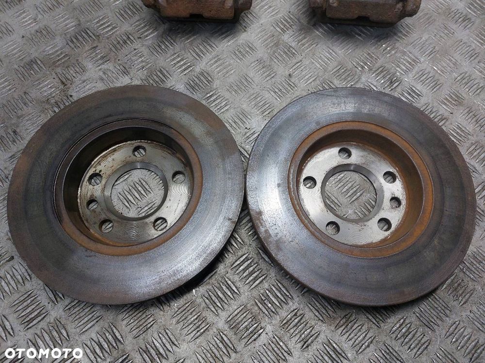 TARCZE HAMULCOWE TYŁ + ZACISKI VOLKSWAGEN TRANSPORTER T4 2.4 D - 3