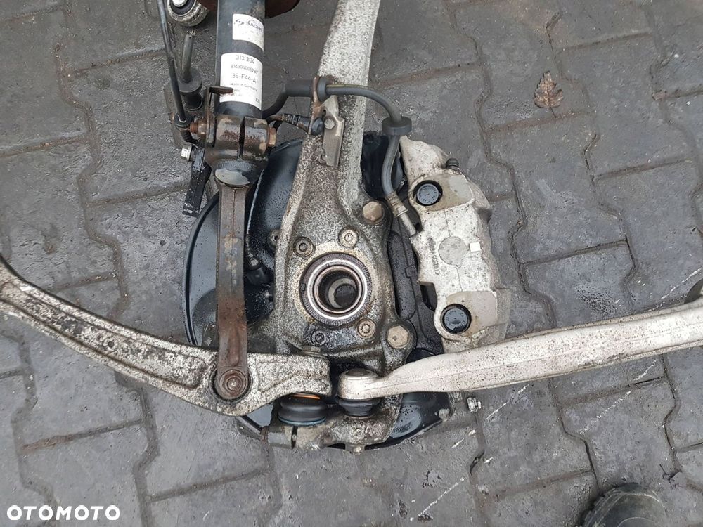 AUDI A6 C7 10-14r 3.0 TDI AMORTYZATOR ZWROTNICA PRAWA PRZÓD 4G0407242C - 4