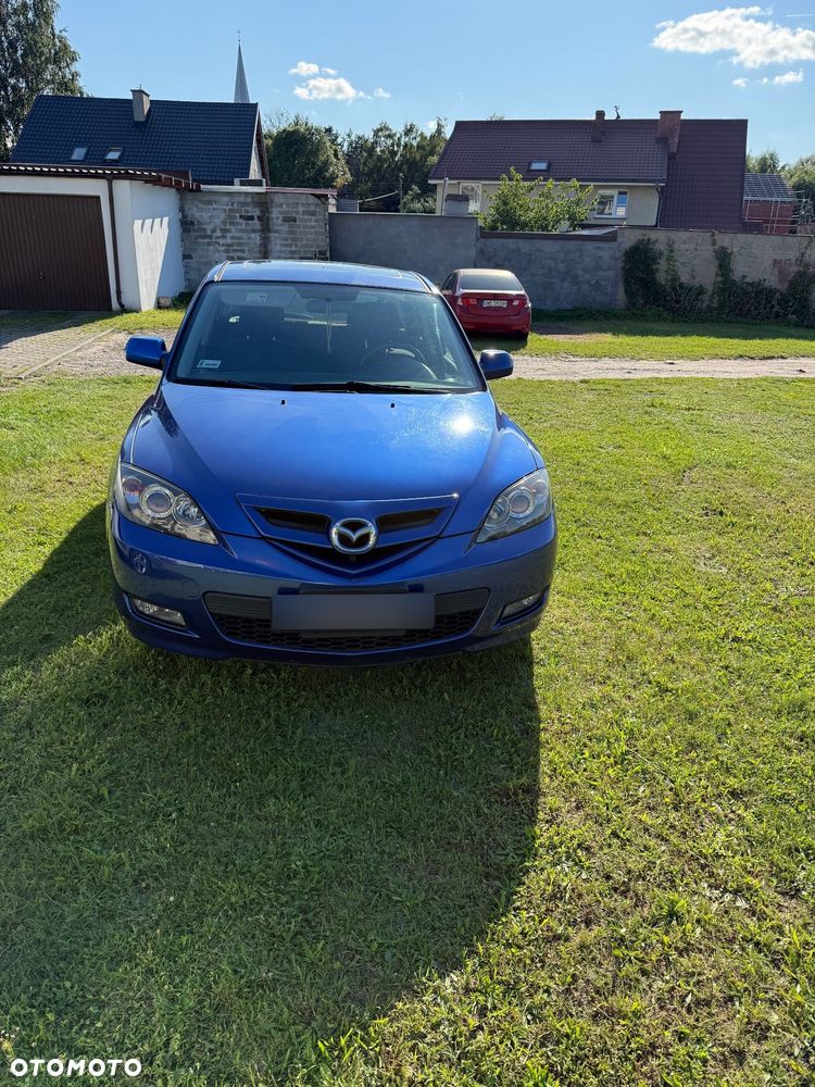 Mazda 323 - 12
