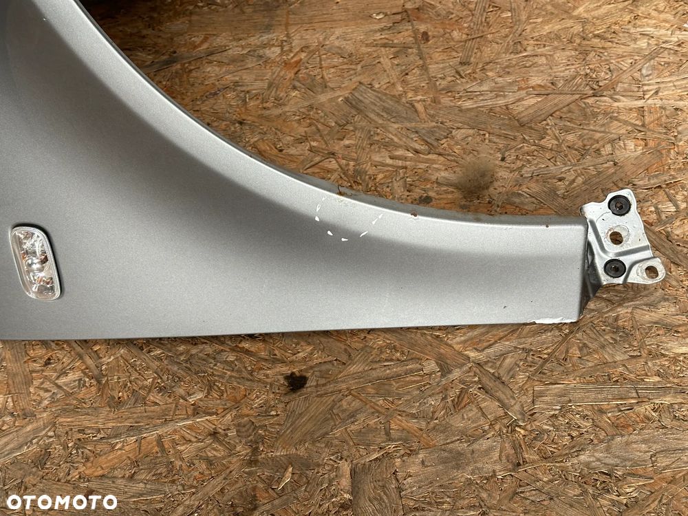 BŁOTNIK PRZEDNI PRAWY AUDI A4 B7 - 4