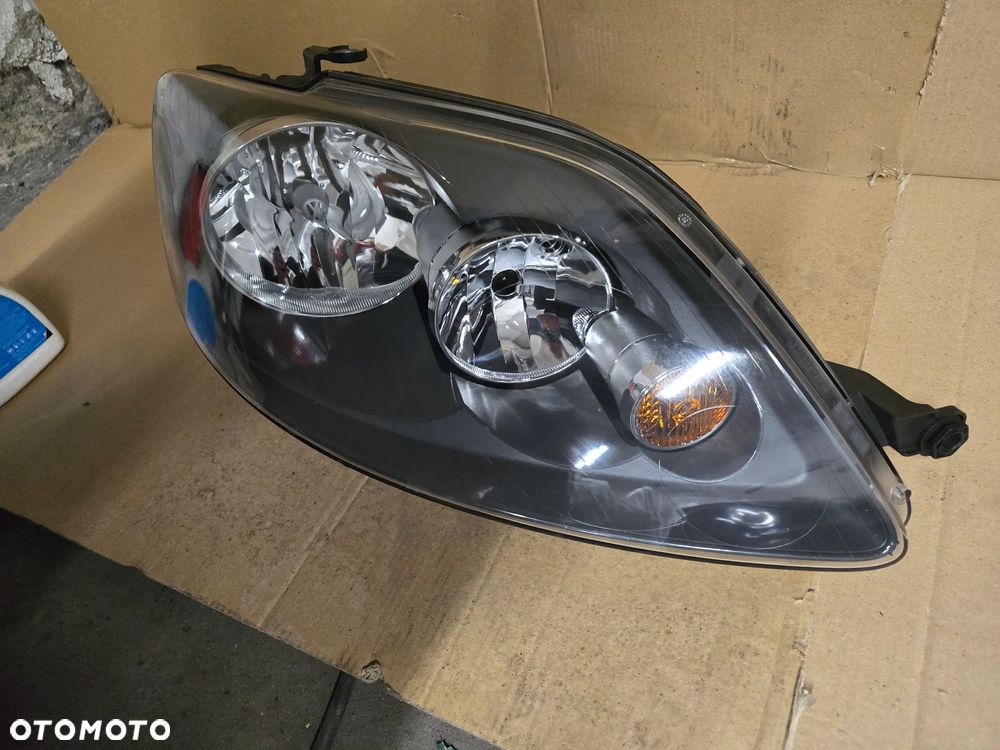 Reflektor prawy vw golf V plus orginał - 2