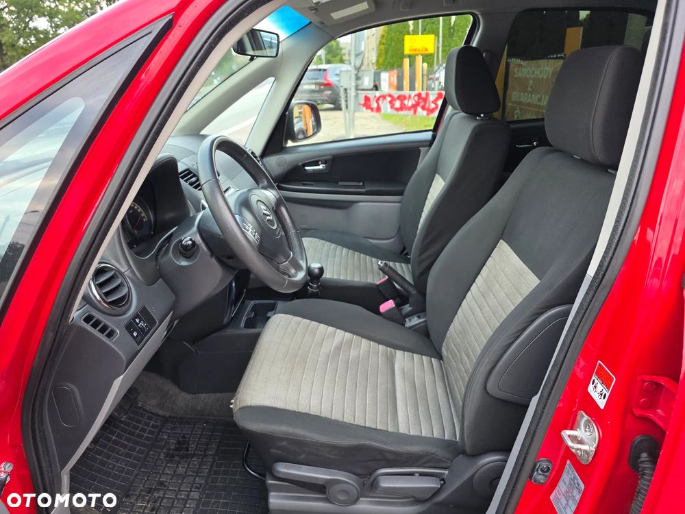 Suzuki SX4 1.6 Comfort Plus - 12