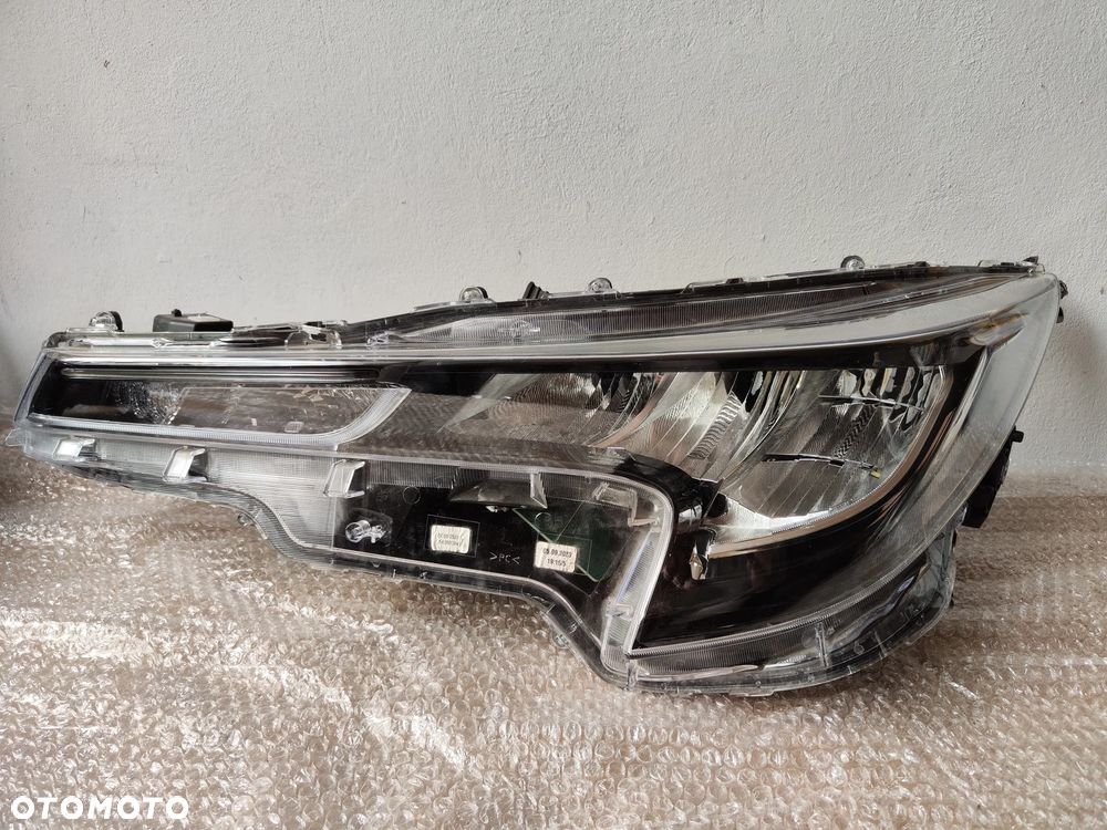 Reflektor LEWY PRZEDNI TOYOTA COROLLA 81150-02S60 LAMPA LEWA