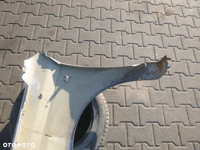 BŁOTNIK PRAWY PRZÓD PRAWY PRZEDNI CHEVROLET AVEO II T250 07-11 - 16