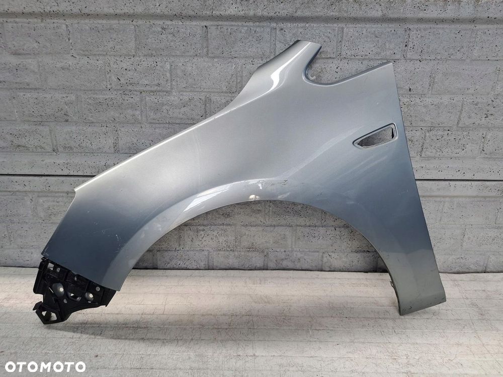 OPEL ASTRA 4 IV J GTC CASCADA 2009-2016 BŁOTNIK PRZEDNI LEWY ORYGINAŁ