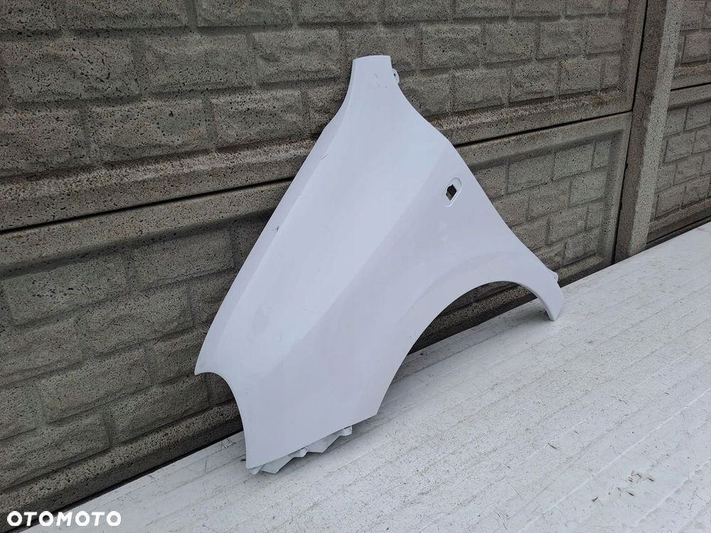 BŁOTNIK LEWY RENAULT TWINGO 3 III 2014 - 2022 - 2