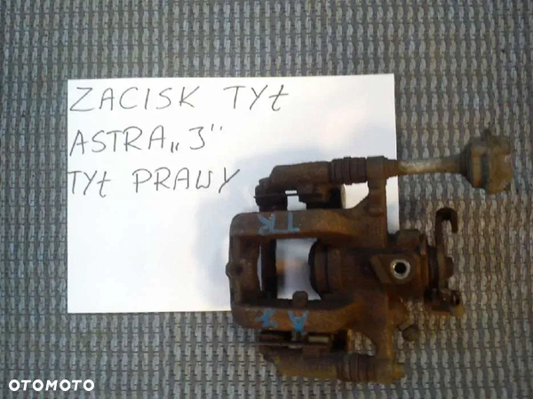 Zacisk Tył Prawy Opel Astra J