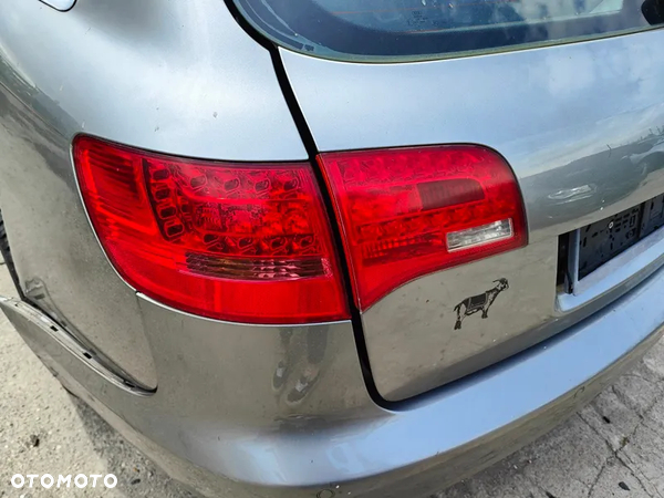 AUDI A6 C6 05r KOMBI LAMPA LEWY TYŁ W BŁOTNIK LED