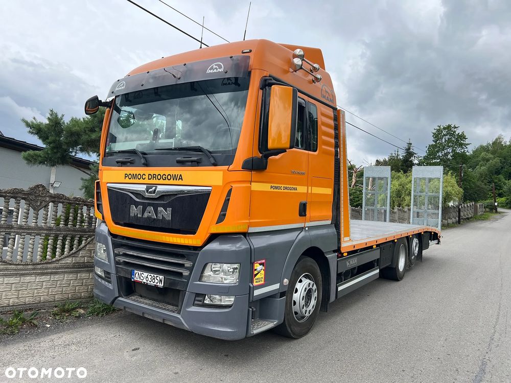 MAN TGX 26.500 | XLX | Euro 6 | 6x2 | INDIVIDUAL | Skrętna Oś | Nowa Zabudowa | Rampy Hydrauliczne | Autolaweta 8,20m | Pomoc Drogowa | Najazd | z Niemiec | STAN PERFEKCYJNY | Tylko 587 tys km | - 2