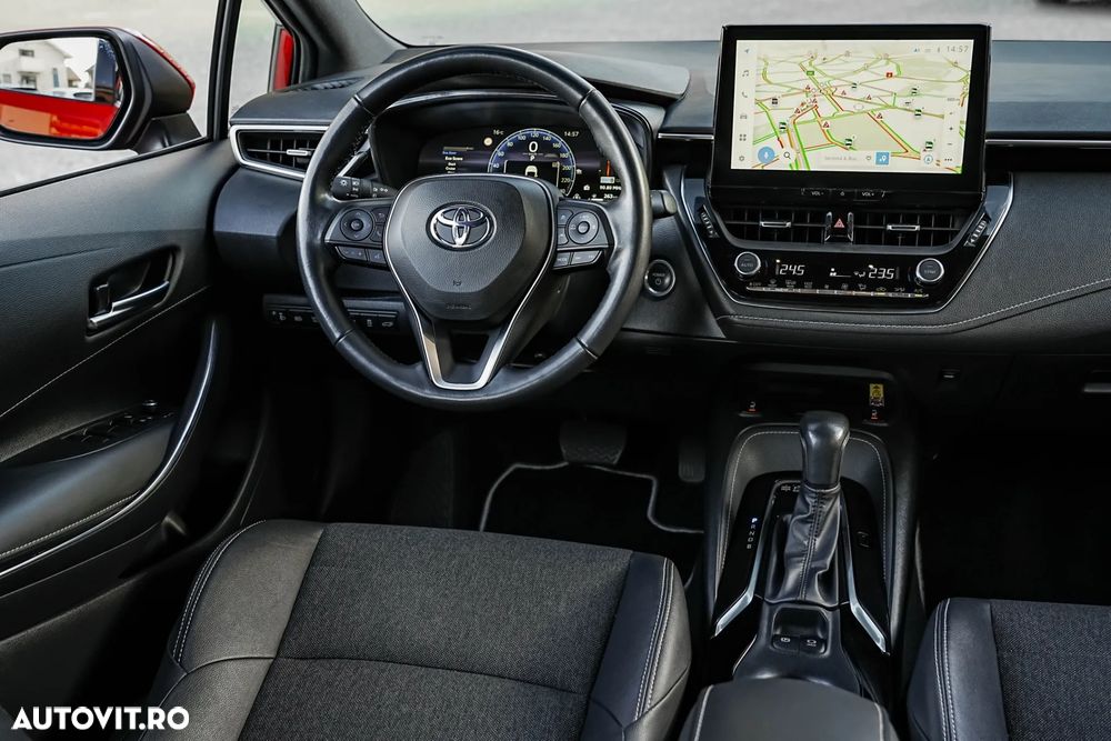 Toyota Corolla TS 1.8 HSD Exclusive - 17