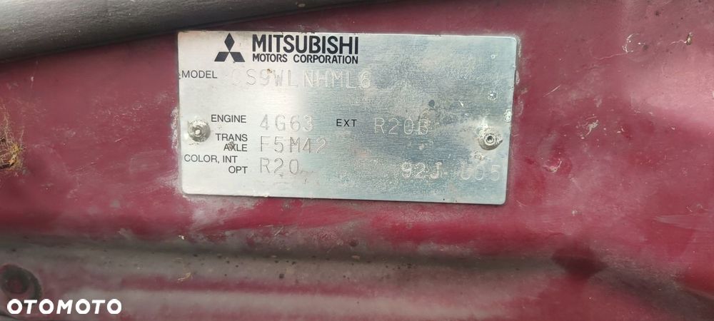 SPRYSKIWACZ REFLEKTORA LAMPY LEWY LANCER VII R20 - 3