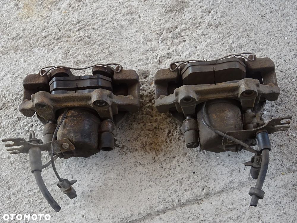 AUDI A6 C5 2,5 ZACISK HAMULCOWY HAMULCA PRAWY LEWY PRZÓD 57mm - 2