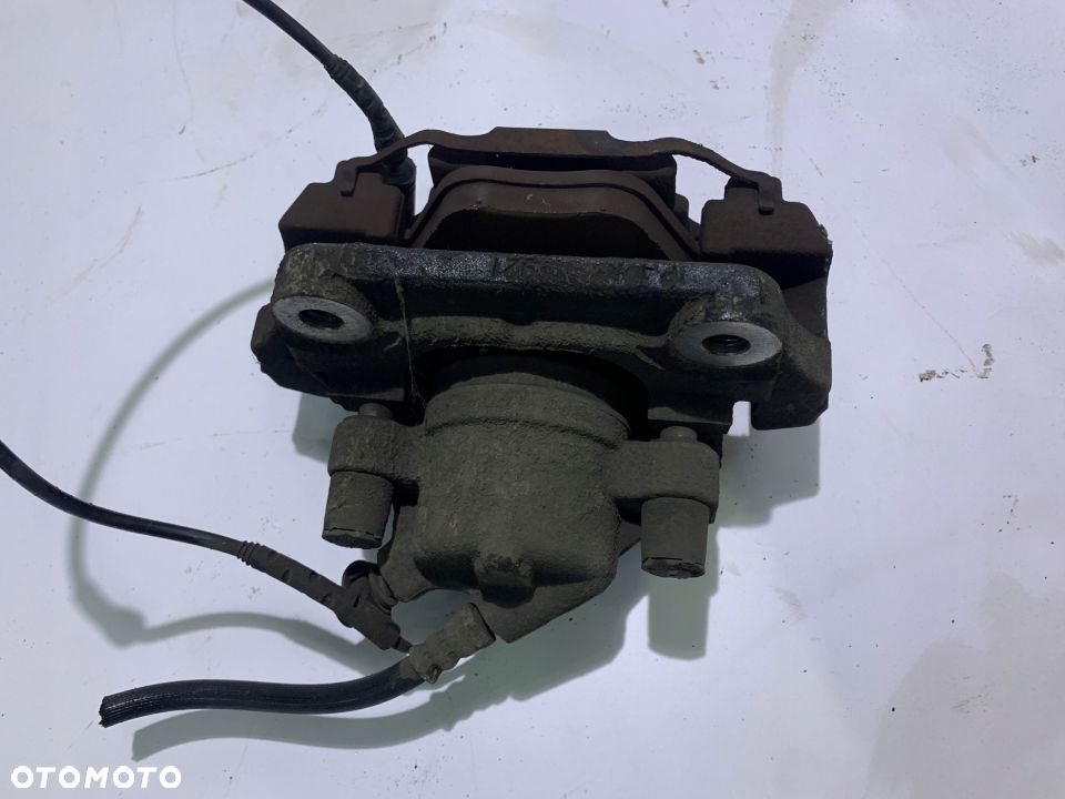 ZACISK HAMULCOWY LEWY 5724 BMW E90 E91 320d - 2