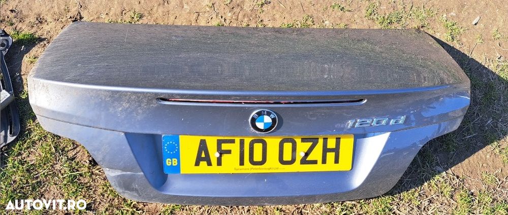 Capota portbagaj in stare buna ( o mica indoitura in stanga ) cu vopseea originala spacegrau mettalic BMW E88 - 1