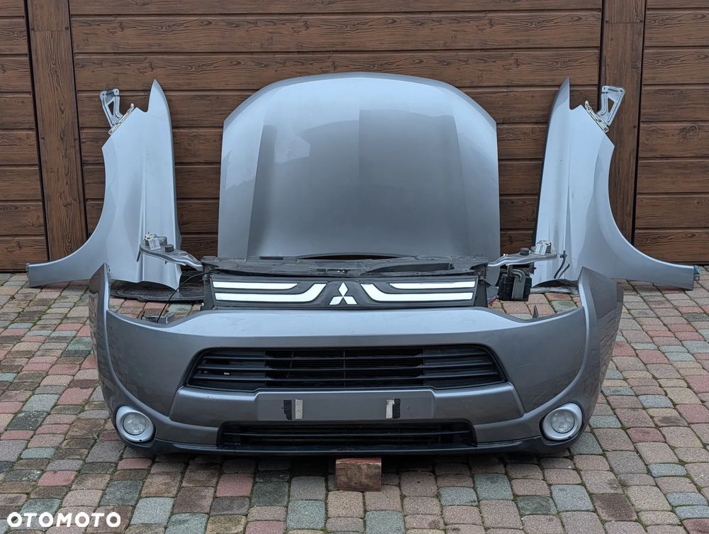 ZDERZAK PAS PRZEDNI MASKA BŁOTNIKI PRZÓD MITSUBISHI OUTLANDER III 2.2 DID U17B