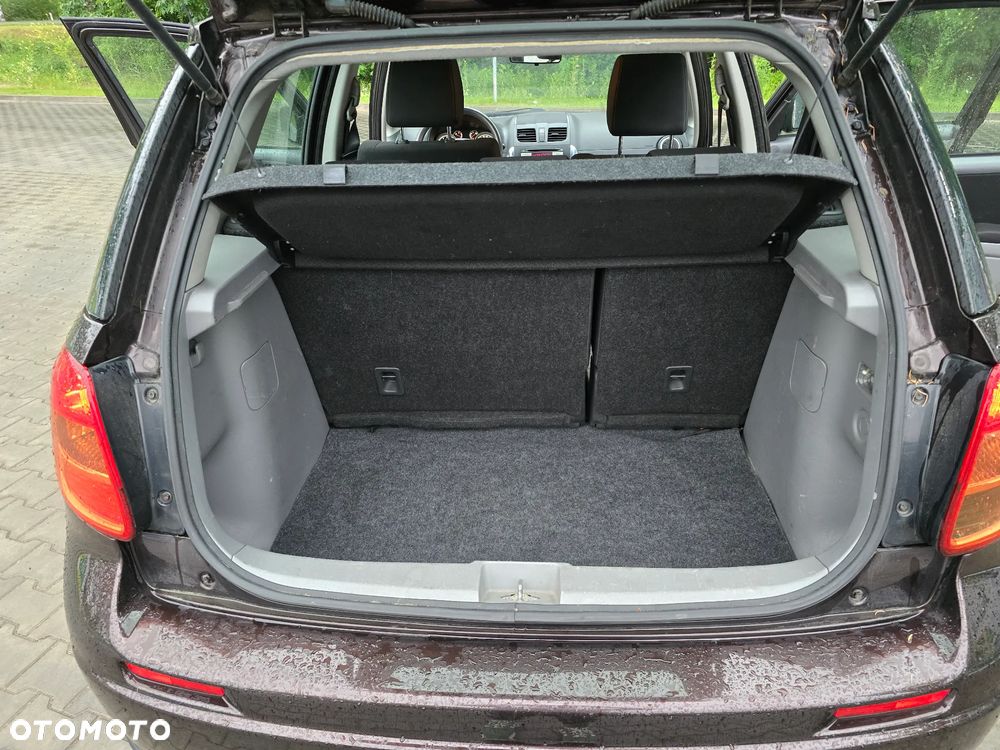 Suzuki SX4 1.6 Comfort Plus - 14