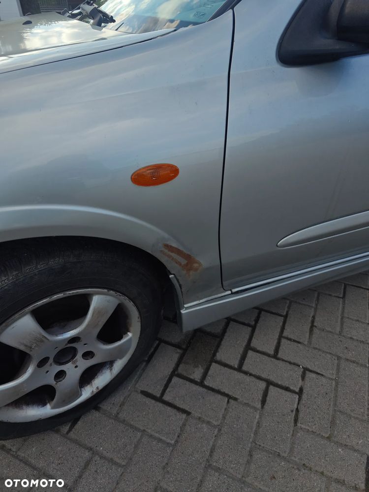 Nissan Almera 1.5 Visia + - 9