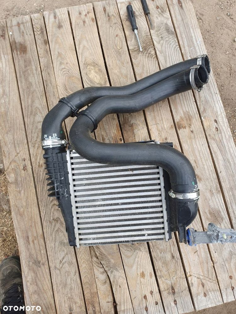 CHŁODNICA INTERCOOLER ORYGINAŁ P9675627980 RIFTER 24R