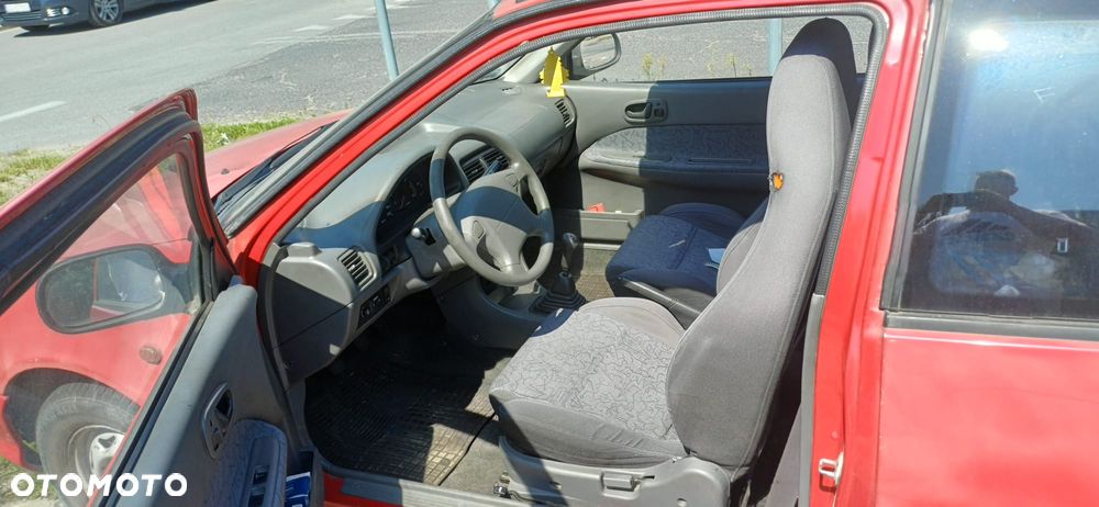 Suzuki Swift 1.0 GLS - 4