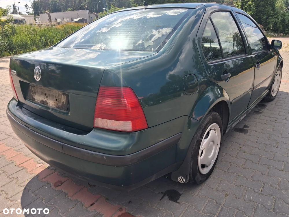 Volkswagen Bora Golf IV 4silnik 1.4 16v 55 Kw 75 KM skrzynia biegów DUU DLP DUW DUS drzwi maska zderzak klapa LC6M lampa grill atrapa lusterko panel sterownik moduł przewód wąż wiązka lewarek maglownica cewka kolektor tłumik wydech alternator rozrusznik fotel kierownica sterownik stacyjka belka sanki mcperson zwrotnica zacisk hamulcowy serwo pompa abs paliwa schowek szyba zamek czujnik sonda sprężarka klimatyzacji zbiorniczek podszybie wahacz zwrotnica NA CZĘŚCI - 11