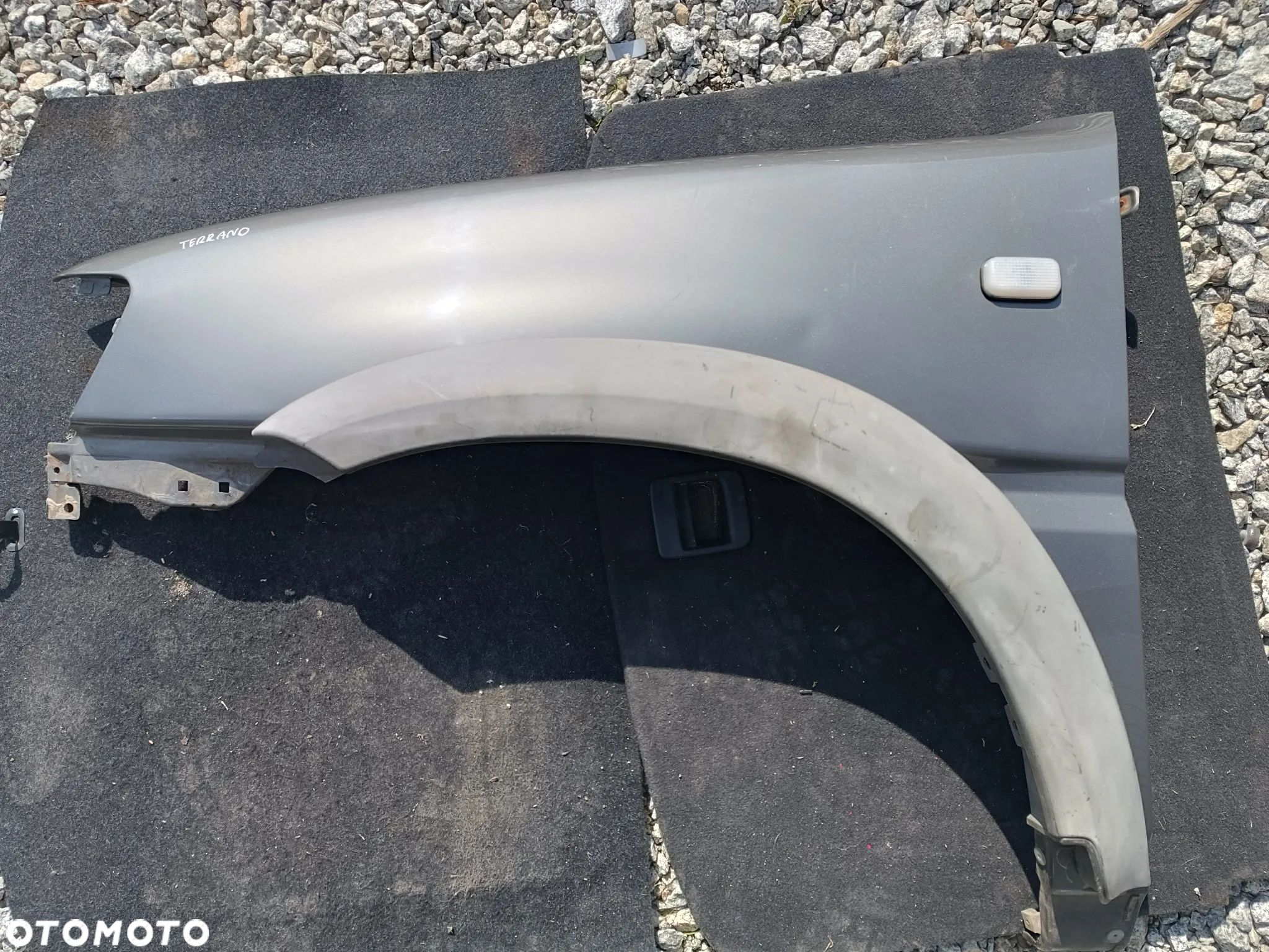 BŁOTNIK LEWY PRZÓD PRZEDNI NISSAN TERRANO II - 1