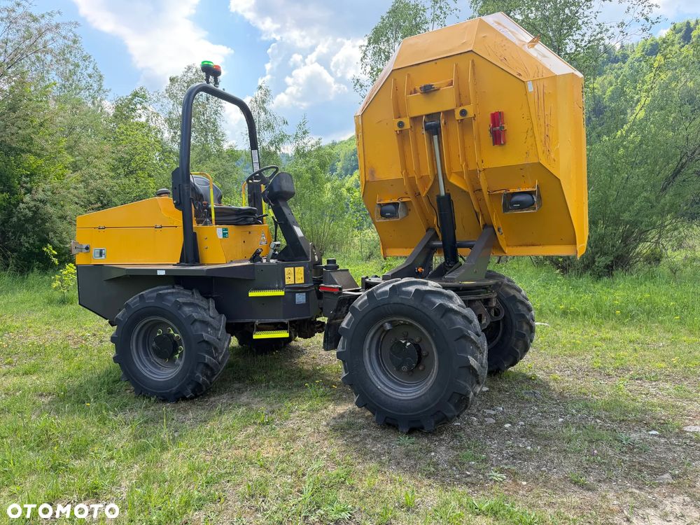 Terex Mecalac TA6s Wozidło wózek z Obrotową Kolebą. 6 ton ładowność. 4x4. Silnik Perkins. 4 cylindry. 808 mtg. 2022 rok. Kamera z wielkim Ekranem! Jazda Rewers 3prędkości. Maszyna jak Nowa z Norweskiego Gospodarstwa! Ani deka luzów i wycieków! Hydrostatic. Pełny Oryginał. Hamulce brzytwa. Serwisy w DEKRA. Maszyna Woziła lekkie ładunki. Praktycznie zerowe zużycie. Wielka Okazja. Wszystko w pełnym Oryginale. Opony Oryginał wszystkie jak Nowe. Komendy Głosowe w maszynie! - 27