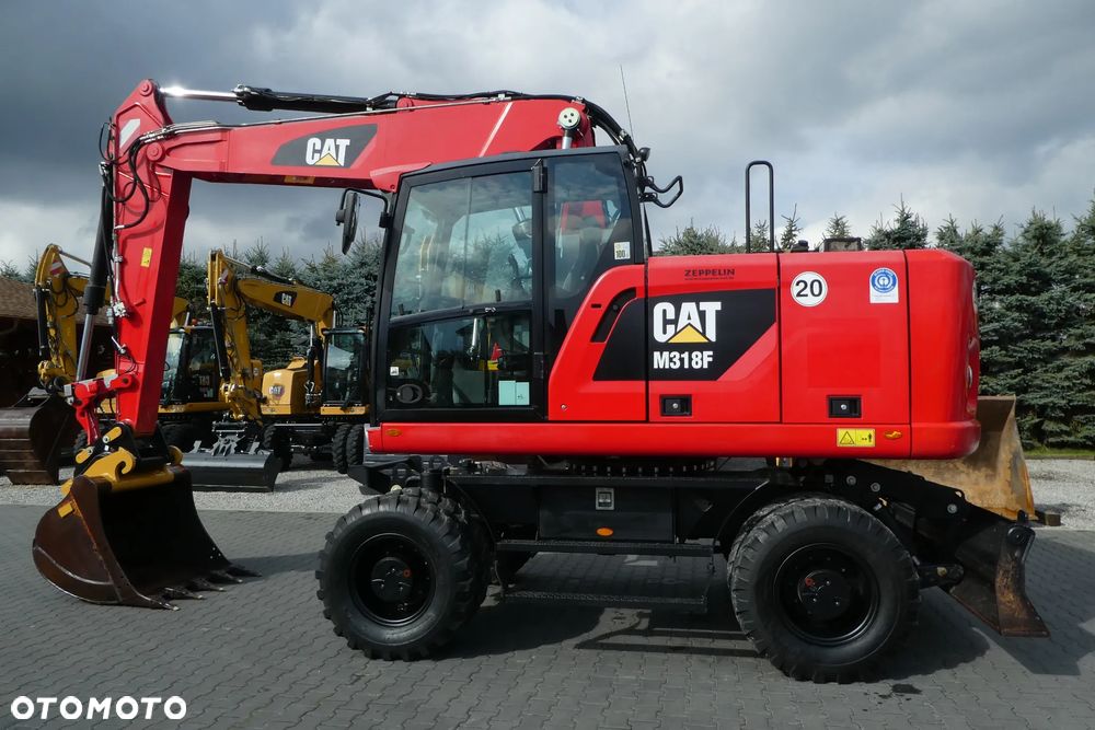 Caterpillar M 318F Z NIEMIEC