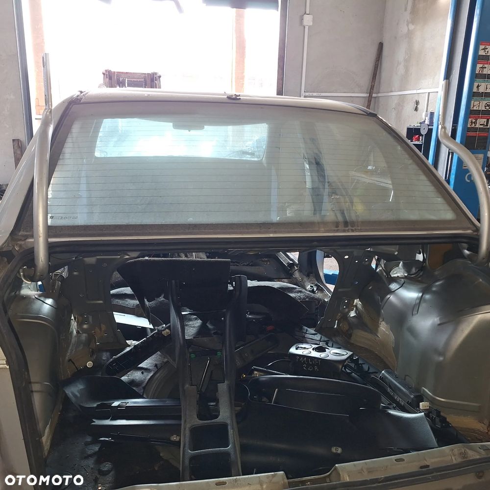 SZYBA TYL TYLNA ASTRA G SEDAN - 1