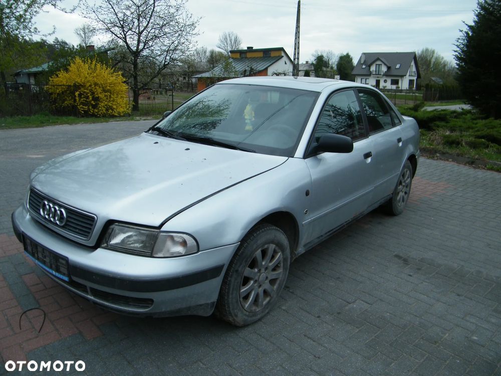 Audi A4 B5 (94-01r.) 1.6 B 100KM. Silnik ADP pasuje do AHL, ANA, ARM Skrzynia CTD lakier LY7M. Cały na części. GWARANCJA !!!  Przód Tył Zestaw Komplet Drzwi Klapa Zderzak Błotnik Maska Grill Atrapa Szyba Pas Lampa Lusterko Boczki Fotel Kanapa Kokpit Deska Rozdzielcza Przełącznik Włącznik Sterownik Przewody Wiązka Instalacja Moduł Komputer Czujnik Listwa Pompa Alternator Wtryski Głowica Rozrusznik Kompresor Sprzęgło Dwumas Silnik Skrzynia ABS Klimatyzacji Paliwa Wspomagania Kolektor Turbina Przepustnica Zawór Chłodnica Koło Hak Belka Sanki Zawieszenie Mcpherson Półoś Amortyzator Wydech Tłumik Zacisk Most - 4