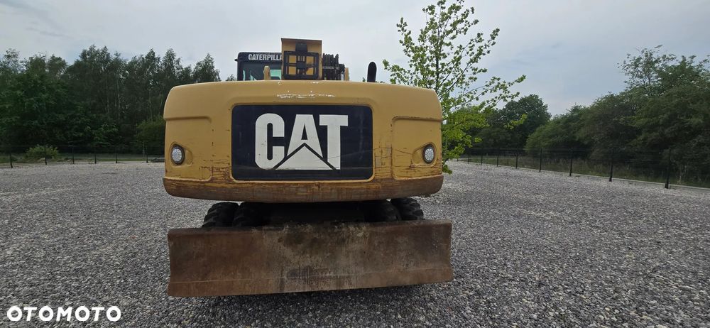 Caterpillar M318D - 4